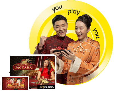 You Play You.    Asian couple looking at phone at games.